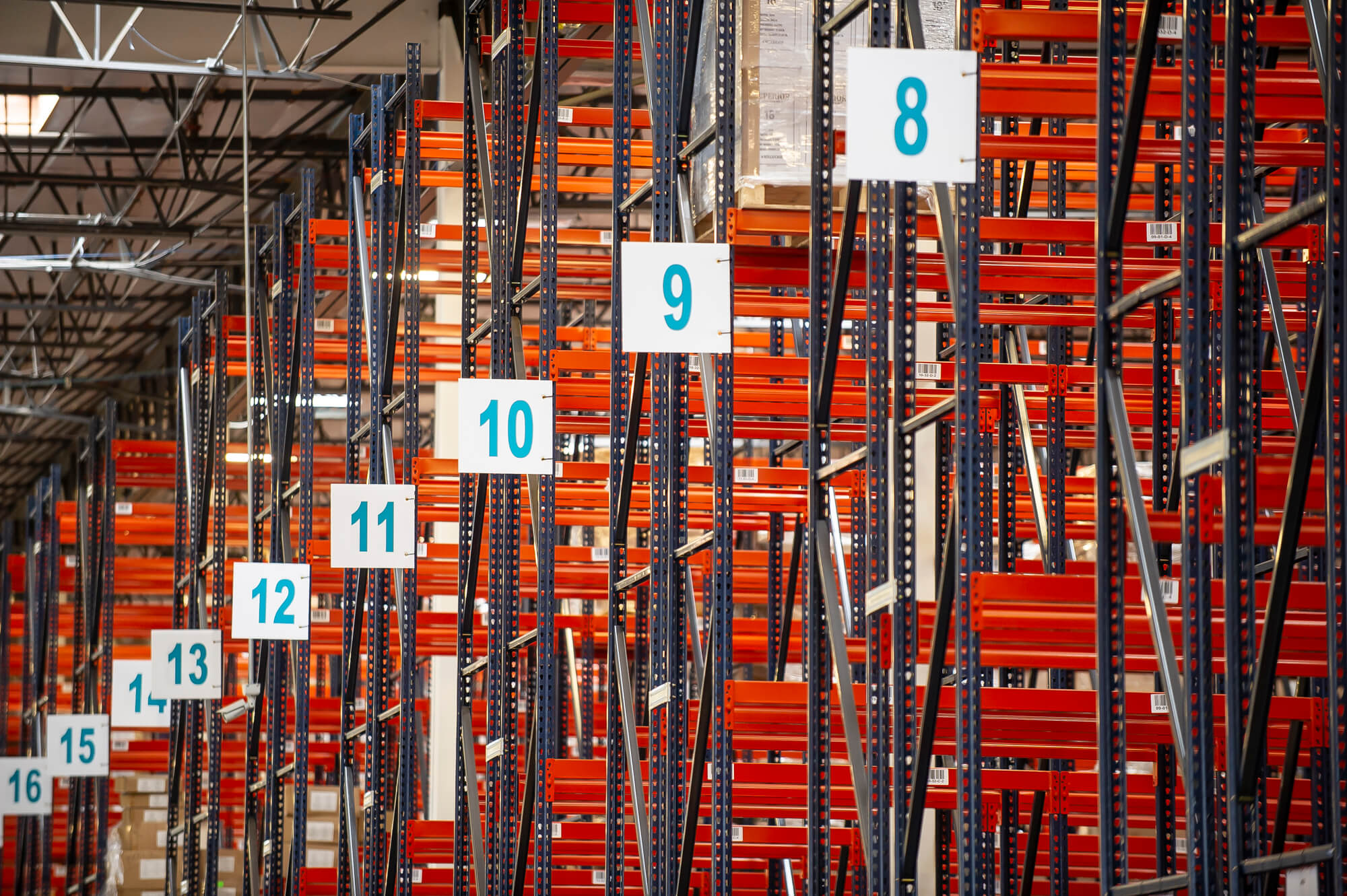 Photograph of warehouse racks at Toll Group warehouse.